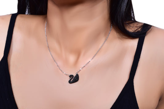 Elegant silver necklace featuring a black swan pendant encrusted with black crystals, adding a touch of sophistication and charm