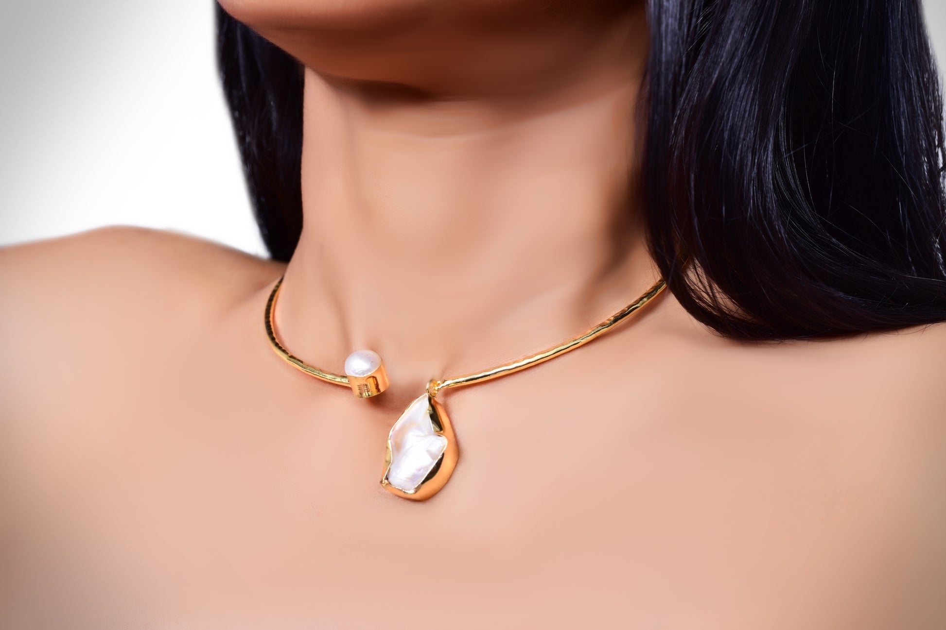 Elegant handcrafted gold choker necklace featuring unique baroque pearl accents, perfect for statement jewelry lovers and luxury fashion enthusiasts