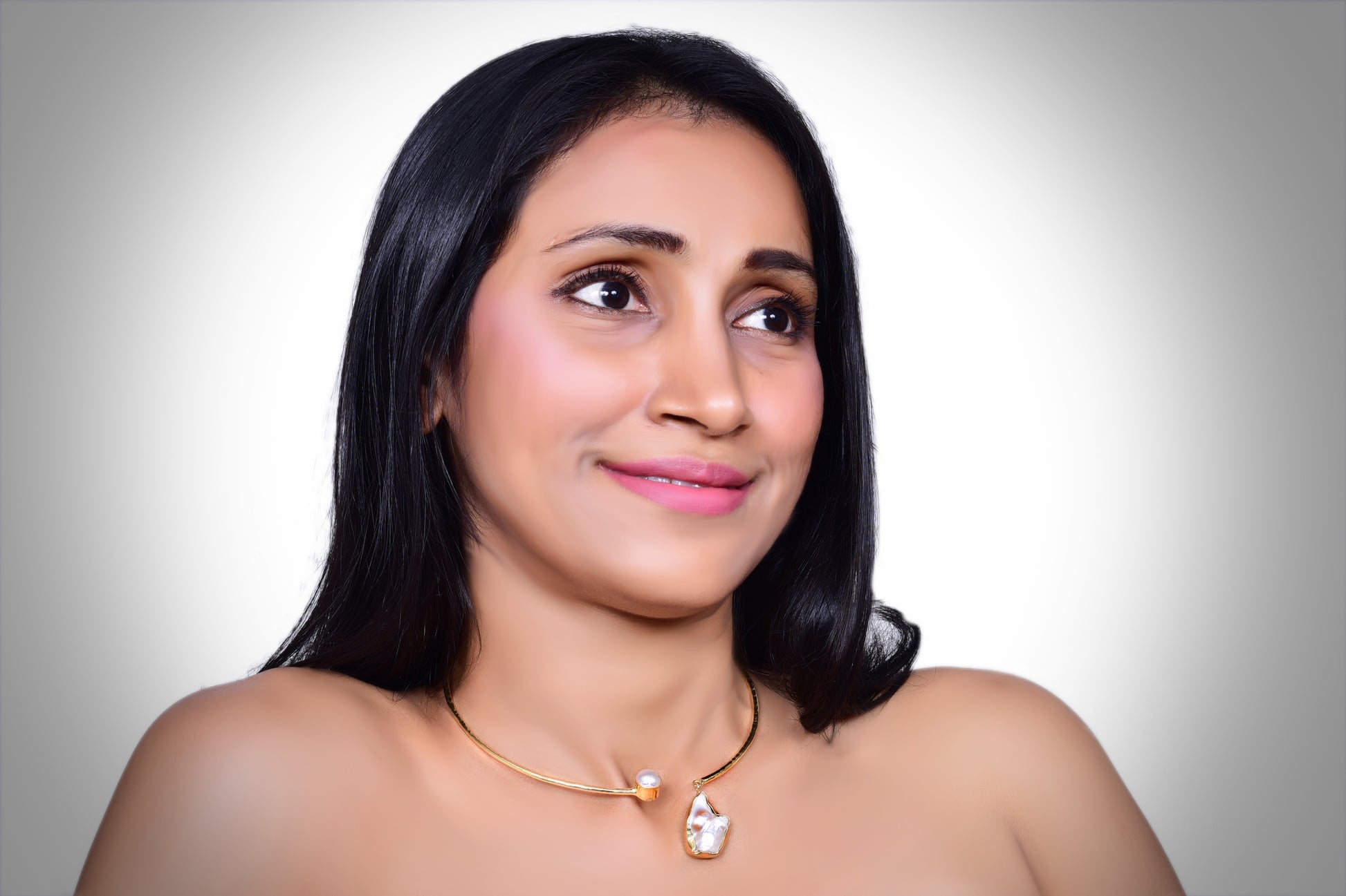 Elegant handcrafted gold choker necklace featuring unique baroque pearl accents, perfect for statement jewelry lovers and luxury fashion enthusiasts