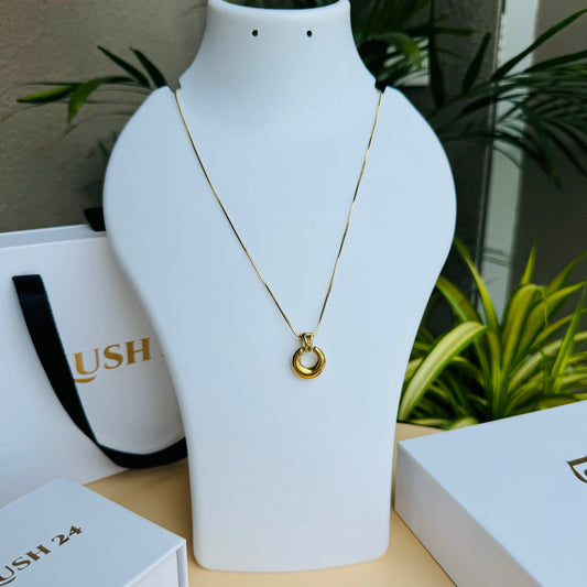 Understated and versatile gold chain necklace on display