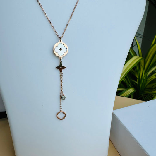 Simple and stylish gold necklace on a jewelry display