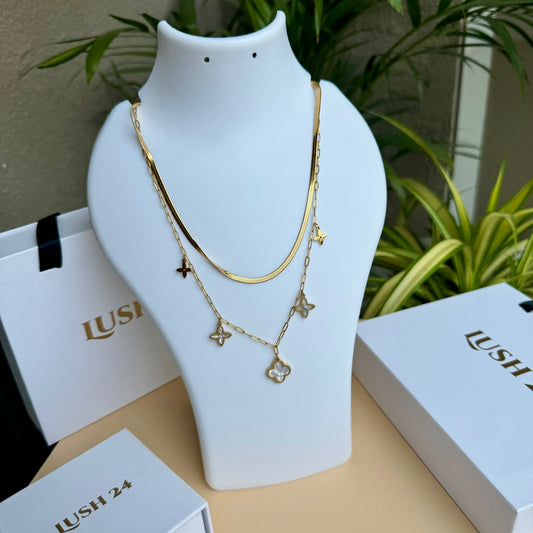 Locally sourced gold chain necklace from "LUSH" displayed on a white bust