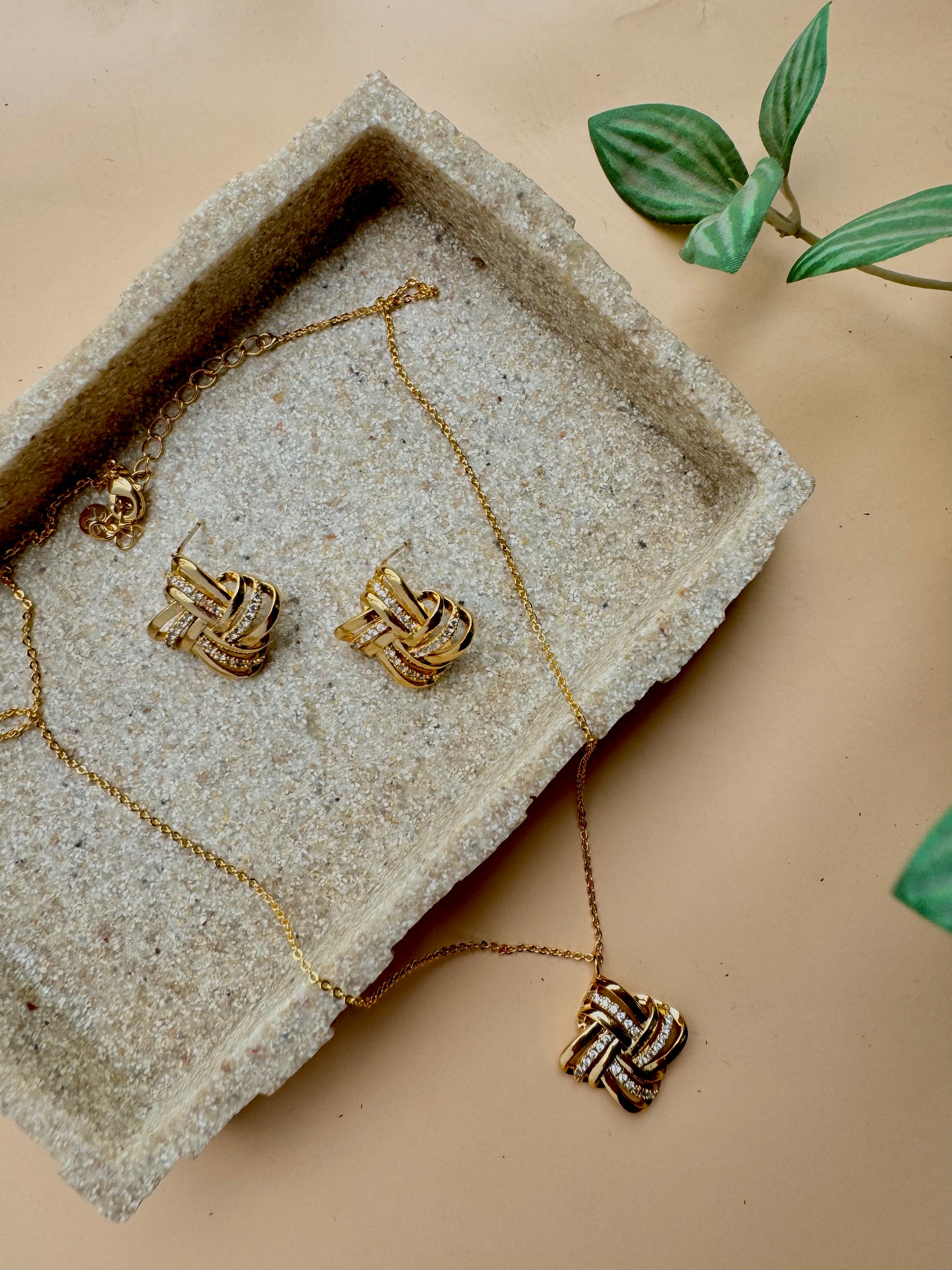Gold love knot pendant and earrings set