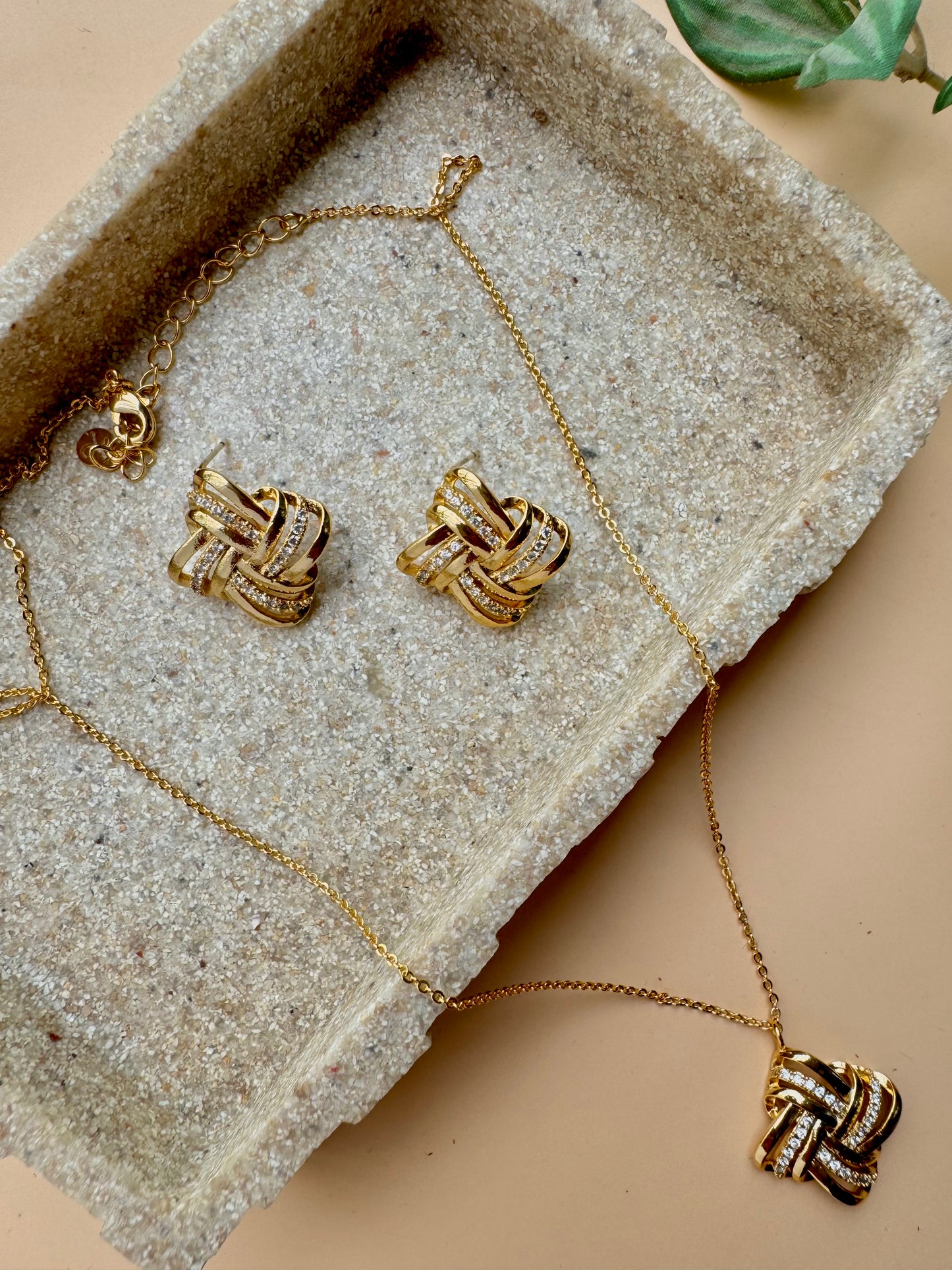 Gold love knot pendant and earrings set