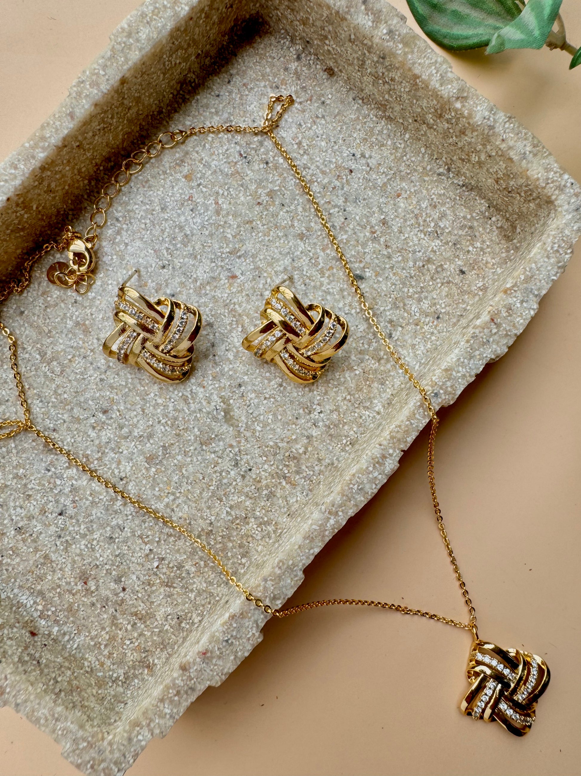 Gold love knot pendant and earrings set