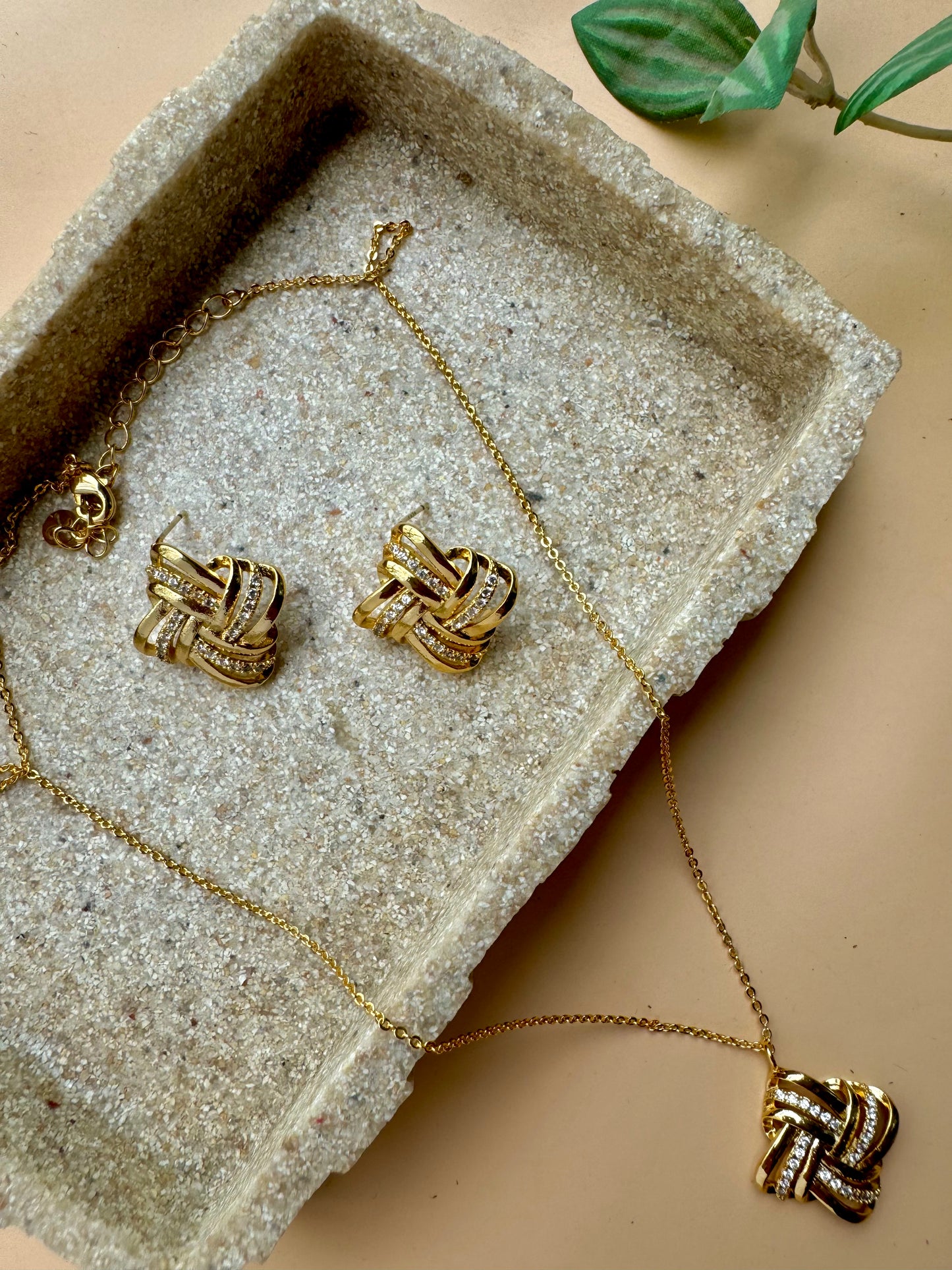 Gold love knot pendant and earrings set