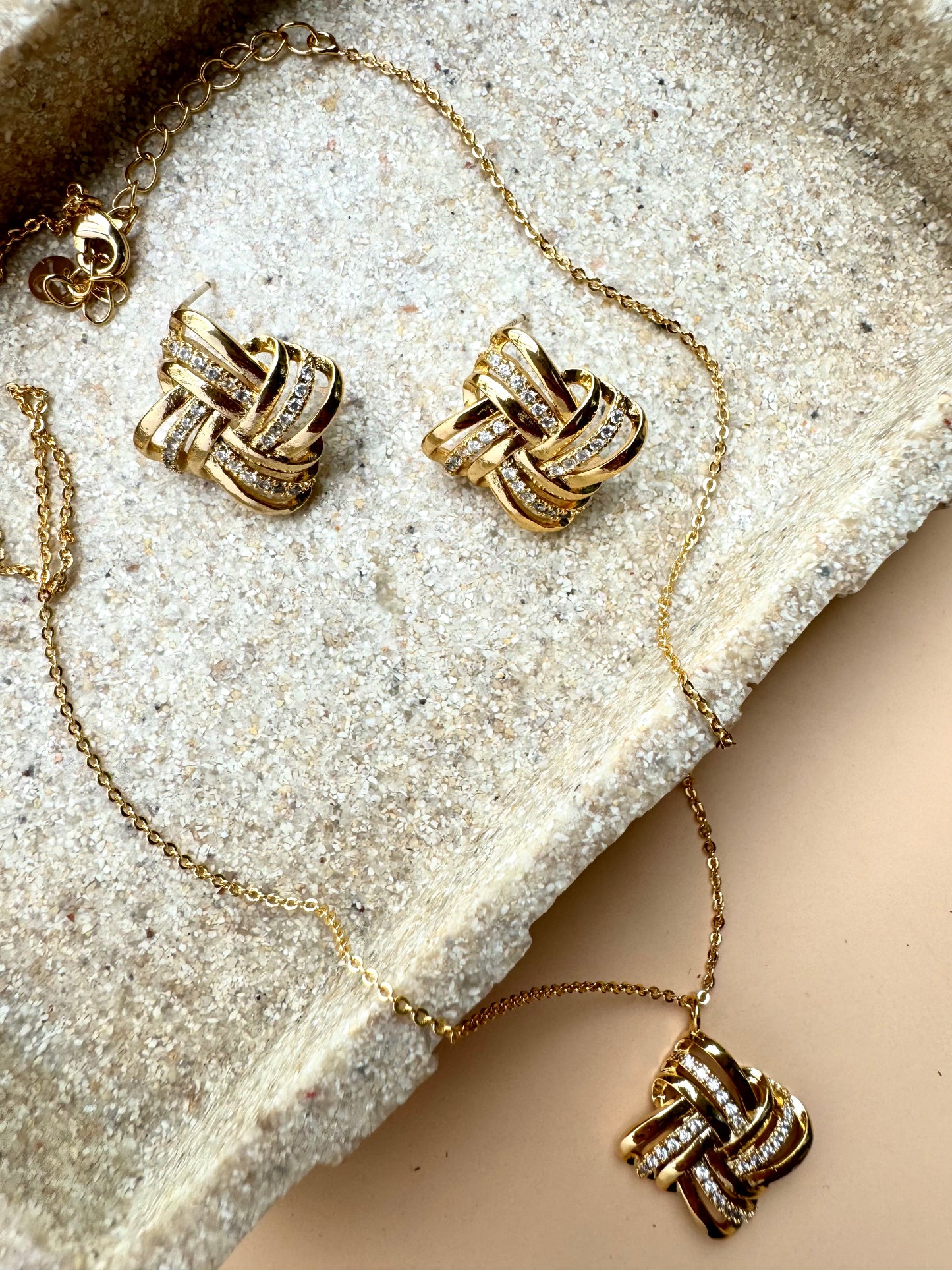 Gold love knot pendant and earrings set