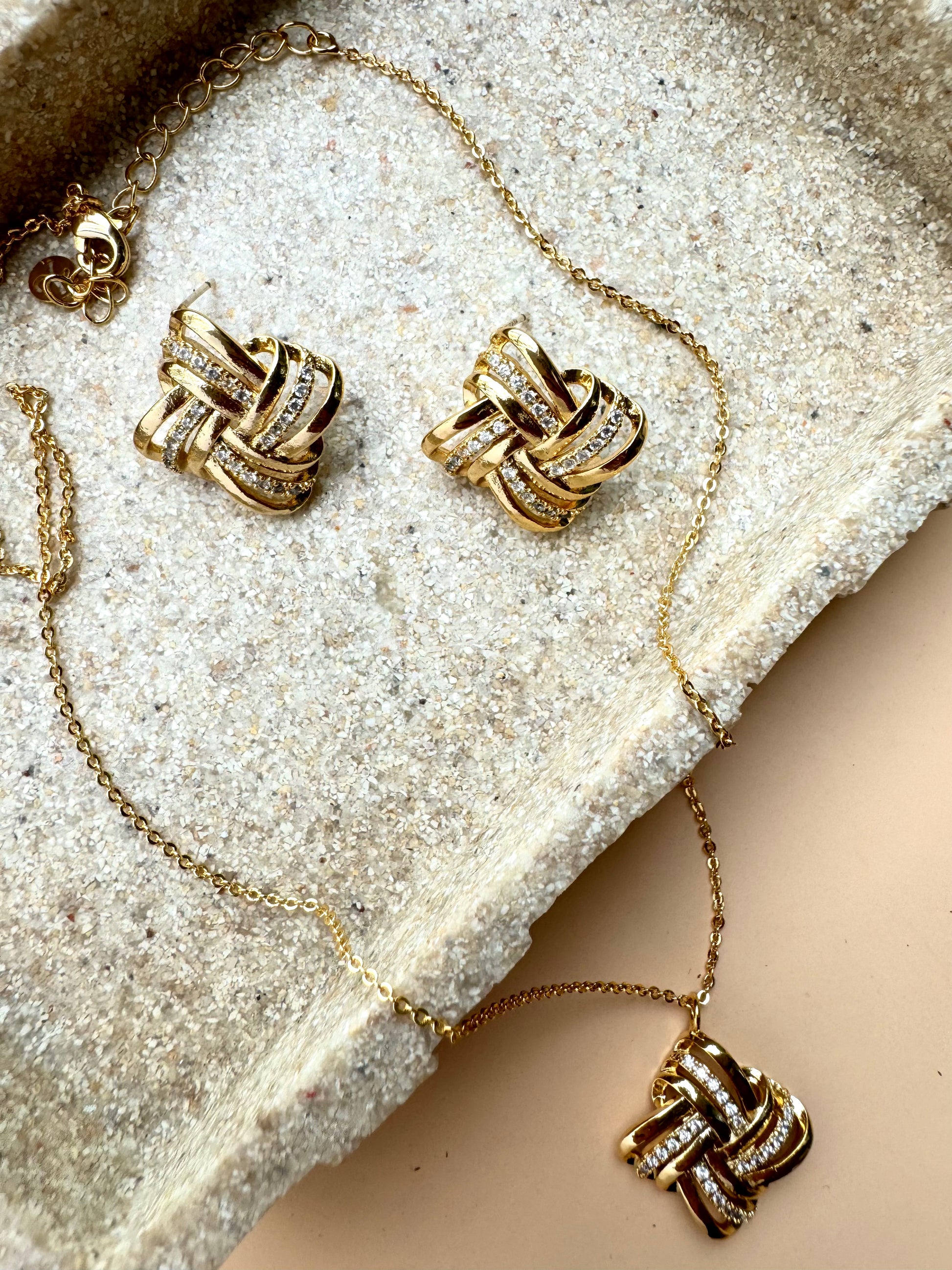 Gold love knot pendant and earrings set